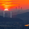 京都市から明石海峡大橋主塔の向こうに沈む夕日を望む 2014年1月
